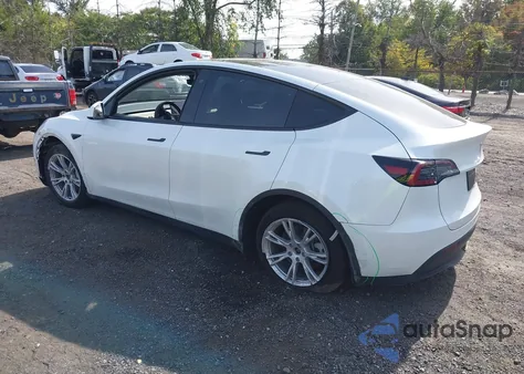 2023 Tesla Model Y Awd/Long Range Dual Motor All-Wheel Drive z USA, uszkodzony, nr VIN 7SAYGAEEXPF759410